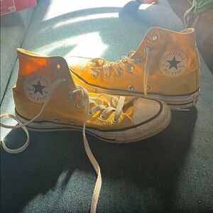 Yellow converse high tops